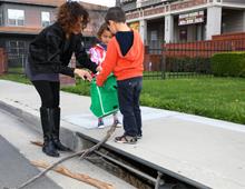 Residents clearing a drain 