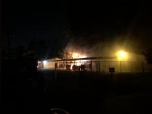 firefighters working structure fire